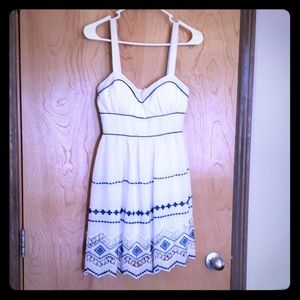 White sundress with blue embroidery